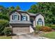 Charming two-story home with manicured landscaping, and a two car garage at 5730 Paces Pl, Suwanee, GA 30024