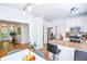 Bright kitchen with modern appliances and an adjacent dining area at 5730 Paces Pl, Suwanee, GA 30024