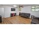 Spacious living room featuring hard floors and plenty of space for relaxing at 5730 Paces Pl, Suwanee, GA 30024