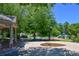 Community playground area featuring a splash pad, playground equipment, and seating at 5730 Paces Pl, Suwanee, GA 30024