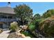 Landscaped water feature, complete with small waterfall and rock accents, leading up to home at 5730 Paces Pl, Suwanee, GA 30024