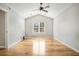 Bedroom features vaulted ceiling, neutral paint, hardwood floors and natural light at 619 Rivulett Ct, Lawrenceville, GA 30043