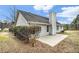 Charming home with siding, a patio, and mature landscaping in the backyard at 619 Rivulett Ct, Lawrenceville, GA 30043