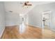 Spacious living room features hardwood floors, vaulted ceiling, and neutral paint at 619 Rivulett Ct, Lawrenceville, GA 30043