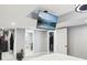 Charming basement bedroom with a ceiling fan and a large TV at 8740 Jenkins Rd, Winston, GA 30187