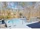 Enjoy the outdoors on this deck with a pergola and above ground pool at 8740 Jenkins Rd, Winston, GA 30187