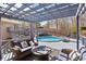 Multi-level deck featuring pool, lounging area, pergola, and outdoor seating at 8740 Jenkins Rd, Winston, GA 30187