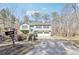 Two-story home with a two-car garage and long driveway at 8740 Jenkins Rd, Winston, GA 30187