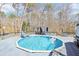 Inviting above ground pool, surrounded by a spacious deck with a gazebo and lounge chairs at 8740 Jenkins Rd, Winston, GA 30187