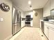 Spacious kitchen with stainless steel appliances, ample cabinet space, and tile flooring at 195 14Th Ne St # Ts8, Atlanta, GA 30309