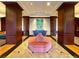 Elegant lobby featuring stylish seating, rich wood accents, and a contemporary art piece at 195 14Th Ne St # Ts8, Atlanta, GA 30309