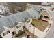 Overhead shot of well-maintained townhomes with manicured lawns and ample parking at 2322 Coach Way, Jonesboro, GA 30236