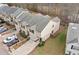 Aerial shot of townhome complex showcasing well-maintained landscaping, parking, and community layout at 2322 Coach Way, Jonesboro, GA 30236