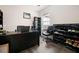 Functional office space with desk, ergonomic chair, and shelving for organized storage at 2322 Coach Way, Jonesboro, GA 30236