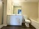 Bathroom featuring a single vanity, shower, and tub combination with modern fixtures at 2795 Greenbridge Drive, Norcross, GA 30071