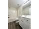 This full bathroom features a shower-tub combo and a vanity with storage at 2795 Greenbridge Drive, Norcross, GA 30071