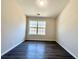 This bedroom features modern flooring and a large window for natural light at 2795 Greenbridge Drive, Norcross, GA 30071