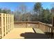 This deck features wood floors and railing with a view of the outdoors at 2795 Greenbridge Drive, Norcross, GA 30071