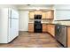 Well-lit kitchen featuring maple cabinets, granite countertops, and stainless steel appliances at 2795 Greenbridge Drive, Norcross, GA 30071