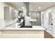 Updated kitchen featuring quartz countertops, stainless steel appliances, and subway tile backsplash at 3081 Oak Dr, Lawrenceville, GA 30044