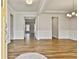 Bright and airy living room with hardwood floors and elegant white trim at 135 Eastmark Way, Fayetteville, GA 30214