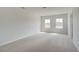 Light and bright bedroom with natural light and neutral color carpets at 250 Arnewood Cir, Mcdonough, GA 30253