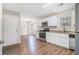 Bright and modern kitchen with granite countertops and stainless steel appliances at 2549 Greenville Way, Decatur, GA 30034