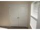 Spacious closet with double doors and natural light from a nearby window at 2139 Theberton Trl, Locust Grove, GA 30248