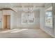 Bright dining area features hardwood floors and coffered ceiling at 132 Felicity Pike, Locust Grove, GA 30248