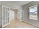Spacious room features French doors, hardwood floors and bright light at 132 Felicity Pike, Locust Grove, GA 30248
