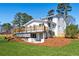 Sprawling backyard with a full deck and basement entrance perfect for outdoor living at 1771 Mount Vernon Rd, Atlanta, GA 30338