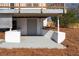 Basement level features a private entrance offering access to the landscaped backyard at 1771 Mount Vernon Rd, Atlanta, GA 30338