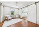 Bedroom features hardwood flooring, and decorative molding and trim at 1771 Mount Vernon Rd, Atlanta, GA 30338