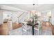 Open dining room showcasing a seamless view into the modern kitchen and inviting living space at 1771 Mount Vernon Rd, Atlanta, GA 30338