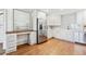 Bright kitchen with custom cabinetry, stainless appliances, and a built-in workspace at 1771 Mount Vernon Rd, Atlanta, GA 30338