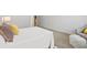 Relaxing bedroom with a plush bed, a cozy chair, and a soft, inviting ottoman at 3903 Shelleydale Dr, Powder Springs, GA 30127
