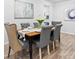 Dining area featuring wood table, neutral-colored decor, and modern furnishings at 3903 Shelleydale Dr, Powder Springs, GA 30127