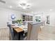 Bright dining area with stylish seating, lovely floors, and contemporary design at 3903 Shelleydale Dr, Powder Springs, GA 30127