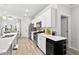 Modern kitchen with white cabinetry, stainless steel appliances, and contemporary design at 3903 Shelleydale Dr, Powder Springs, GA 30127