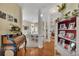 Open-concept layout showcasing dining room with elegant chandelier, seamlessly flowing into the living spaces at 918 Bridge Mill Ave, Canton, GA 30114