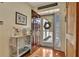 Inviting foyer with hardwood floors, decorative accents, and ample natural light streaming through the front door at 918 Bridge Mill Ave, Canton, GA 30114
