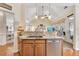 Open kitchen area with granite countertops and a view to the living room at 918 Bridge Mill Ave, Canton, GA 30114