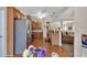 Well-equipped kitchen with stainless steel appliances, hardwood floors, and breakfast bar at 918 Bridge Mill Ave, Canton, GA 30114