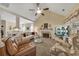 Spacious living room with a fireplace, vaulted ceiling, and a clear view to the dining room at 918 Bridge Mill Ave, Canton, GA 30114