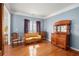 Charming living room with antique furniture and hardwood floors at 4275 Chastain Pointe Nw, Kennesaw, GA 30144
