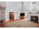 Bright living room with hardwood floors, fireplace, and vaulted ceiling at 4275 Chastain Pointe Nw, Kennesaw, GA 30144