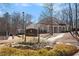 Community Townclub with a sign, landscaped yard, walking path and plenty of parking at 4275 Chastain Pointe Nw, Kennesaw, GA 30144