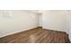 Bedroom with wood-look floors, a window, and neutral wall color at 4593 Parkway Cir, Atlanta, GA 30349