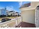 Wood deck view of street with neighboring homes and blue sky background at 4593 Parkway Cir, Atlanta, GA 30349