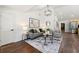 Modern living room with stylish decor, hardwood floors, and stainless steel appliances at 2133 Trailwood Rd, Decatur, GA 30032